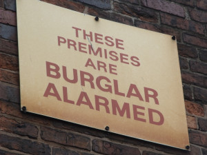 a burglar alarm sign