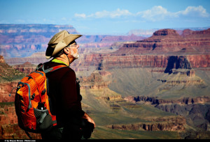 hiker looking at Grand Canyon