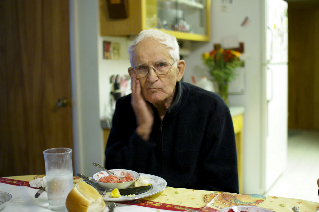 Grandpa eating healthy breakfast.